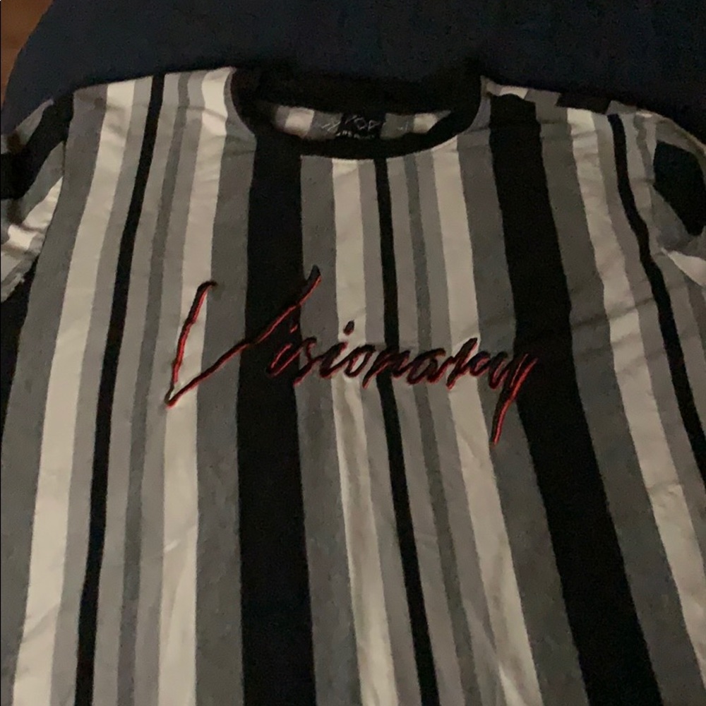 Visionary’s shirt